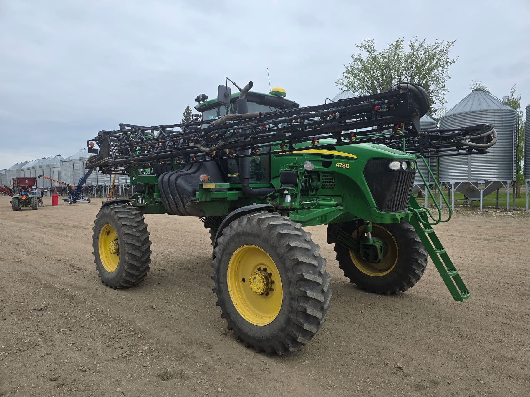 The high-clearance sprayer in the yard
